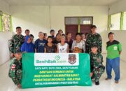 Satgas Pamtas Yonarhanud 1 Kostrad Bersama Yayasan Benih Baik Salurkan Bantuan Sembako di Wilayah Perbatasan